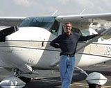 Vern Standing by Plane